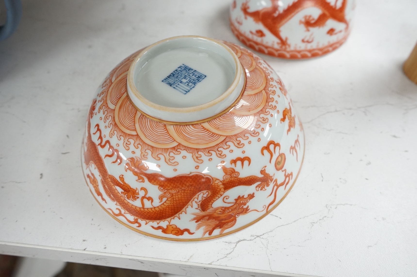 A Chinese rouge de fer dragon bowl, and a similar beehive water pot, Qianlong and Daoguang seal marks but later, bowl 15.5cm diameter